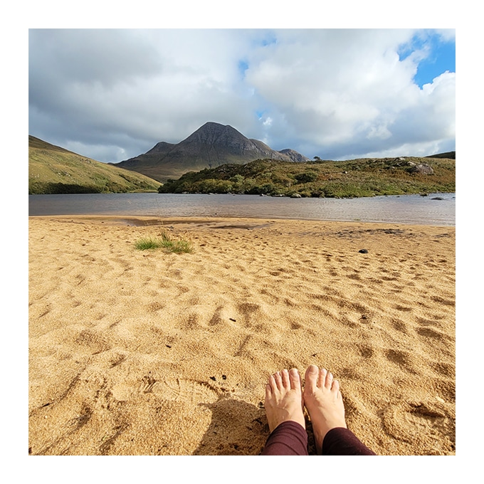 An image of a beautiful beach in the scottish highlands demonstrating a peaceful place in nature
